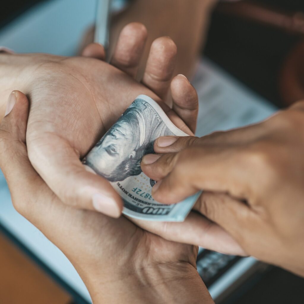 Individuals Are Giving Bribes To Officials In Orde WQZ4Z9H Scaled 1 1024x1024