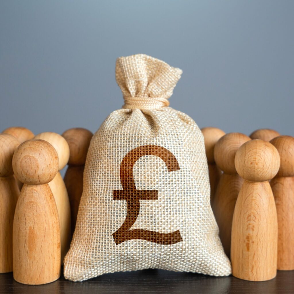 People Figures Stand Around British Pound Sterling BT3UDVX Scaled 1 1024x1024